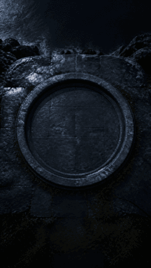 A circular dial sits in a rocky platform above a dark coastal landscape.